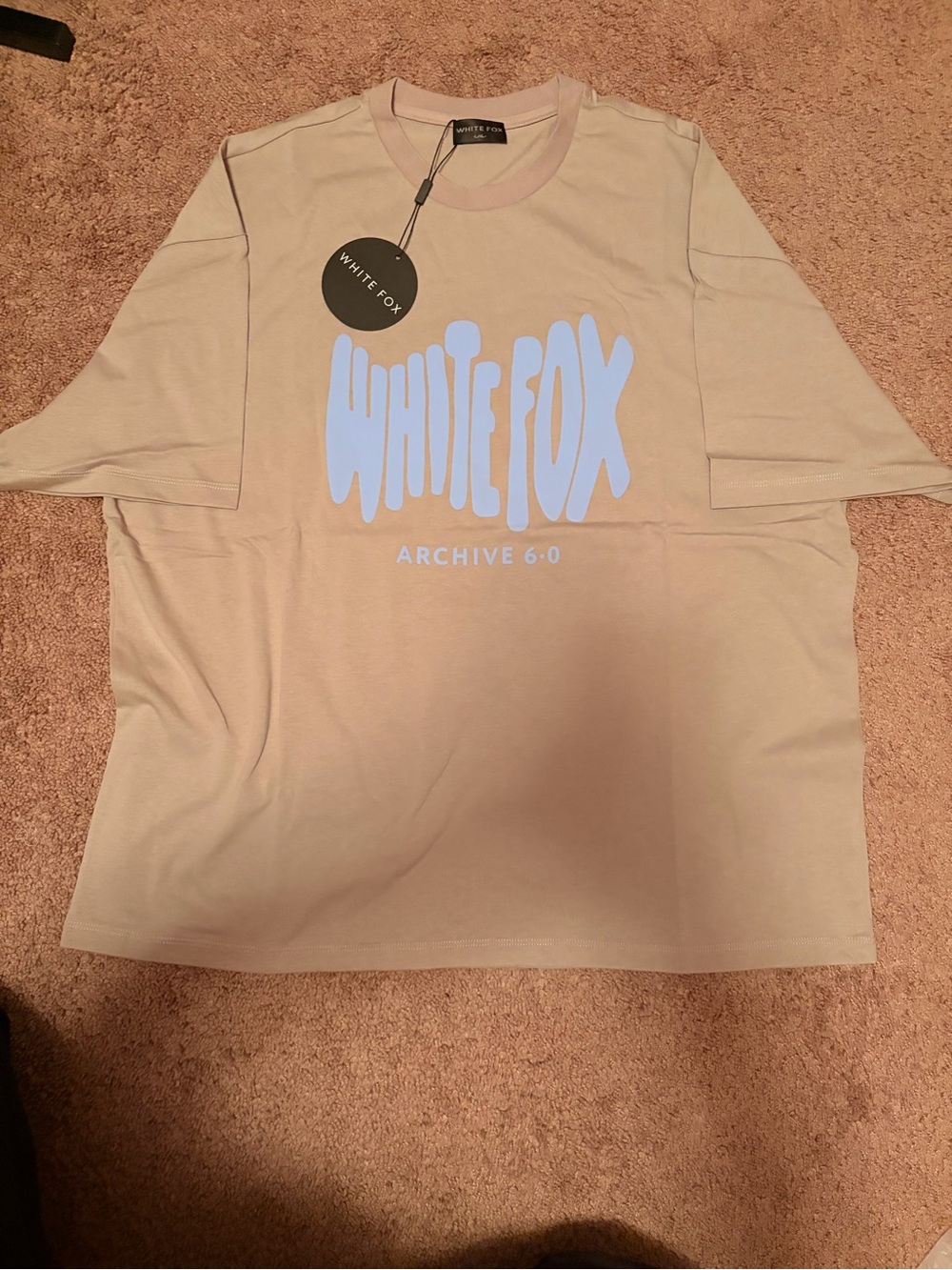 White Fox Boutique Beige Tee with Pale Blue Logo
